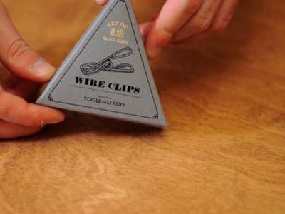 Boîte de wire clips Tools to Liveby tenue entre les mains